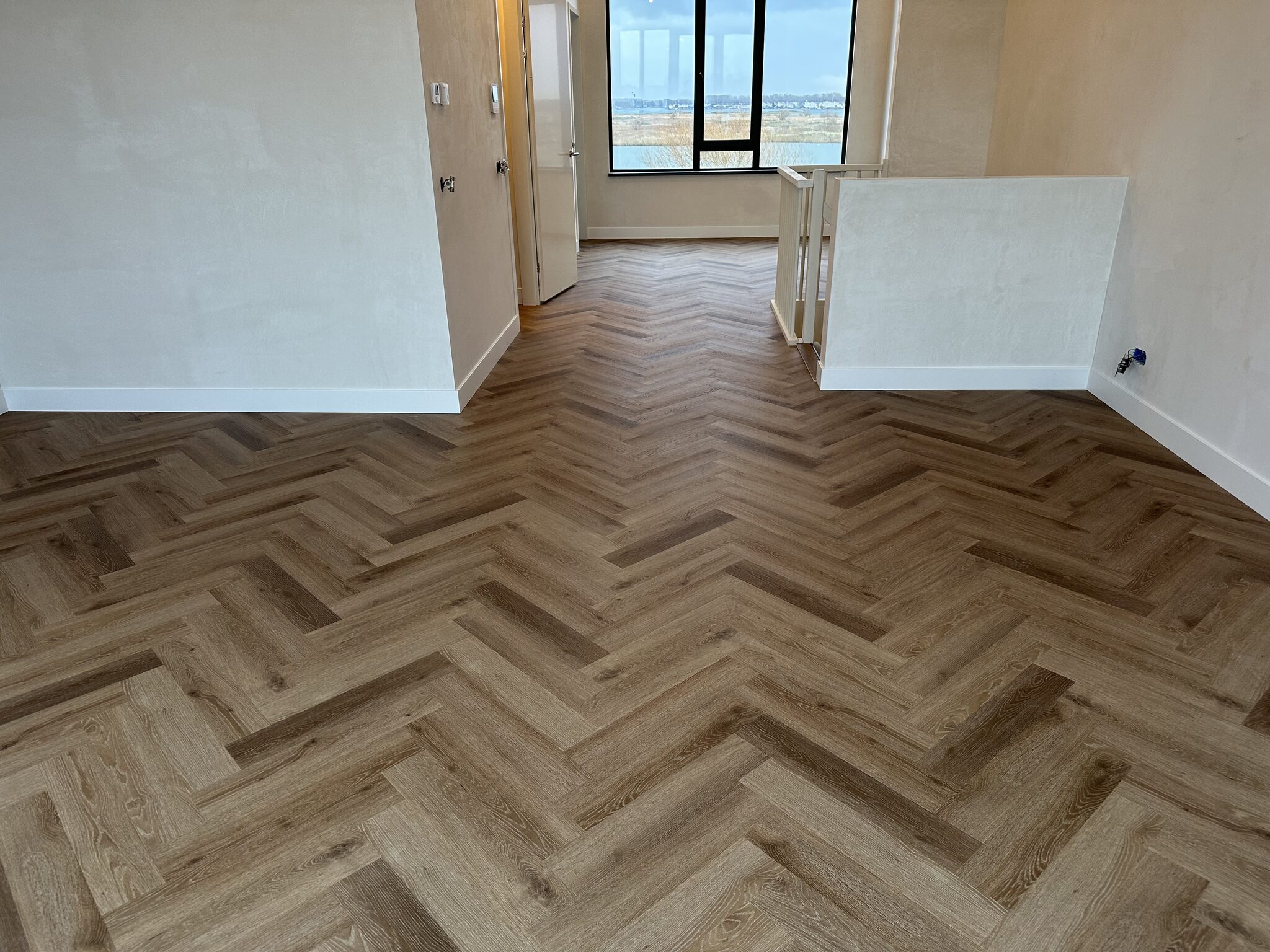 PVC visgraat vloer en traprenovatie Almere - foto 3